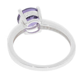 Round Purple Sapphire Sterling Silver Ring showcasing its elegant band and stunning gemstone from the back.